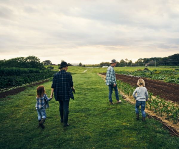 Australian Family Walking Around The Farm